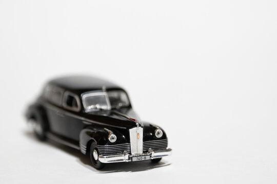 Bucharest Romania 10 January 2026. Black ZIS-110 scale model limousine isolated on white background. Classic Soviet luxury car miniature with vintage design and chrome details