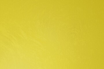 Obraz premium Bright gold concrete rough texture. Light is coming from bottom left