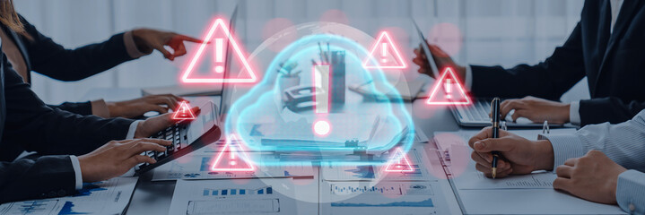 Red alert triangles over a blue cloud icon, symbolizing cloud security threats, system warnings, and data protection risks in digital environments Parse