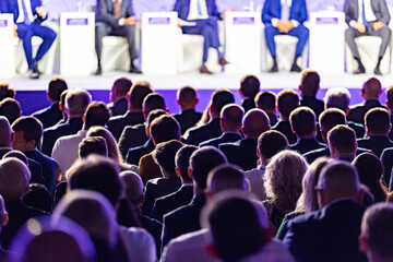 Russia. Sochi. Speakers and audience at a meeting.
