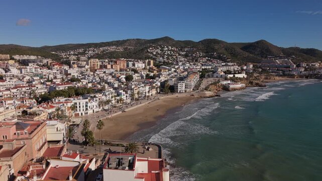 curving over beach in Sitges Spain