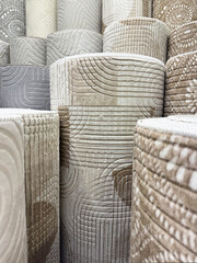 Decorative carpet runners with embossed texture displayed indoors. Neutral colors create warm atmosphere, home comfort concept, modern interior design and textile flooring.