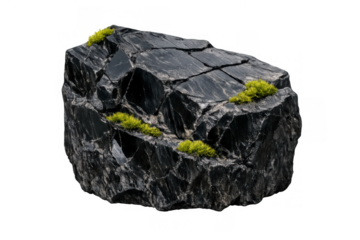 Dark rock with green moss growing on a textured surface, showcasing natural rugged geology on transparent background