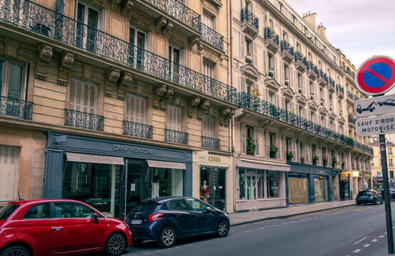 Paris, France 08 04 2023: Summer sunset on Rue des Saints-Peres street in Paris, France. Its name comes from the alteration of "Saint-Pierre", the name of an old chapel of the former hospital of