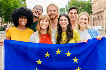 European community celebrating together with EU flag. Young people showing unity and connection across Europe. European identity and unity concept. © Xavier Lorenzo
