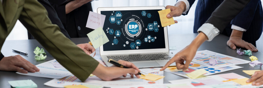 Analyst team use sticky note for creative and analytic brainstorm for business idea with BI data dashboard on laptop screen. Analysis financial data visualization tech for marketing strategy. Prodigy - Powered by Adobe