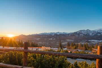Tatry mountains at sunrise seen from Gubalowka hill in Zakopane. Poland