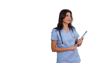Female medical professional standing, holding a tablet, wearing scrubs and a stethoscope on transparent background