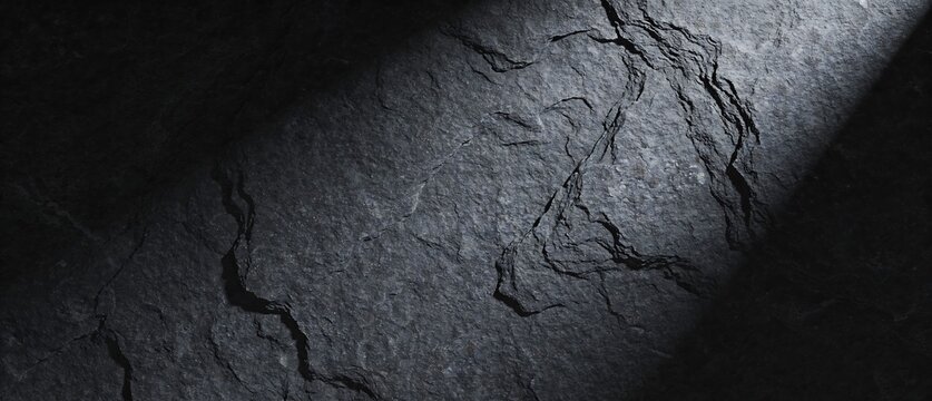 深い炭色の石面が生む重厚な質感背景