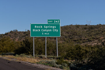 exit 242 sign on I-17 for Rock Springs and Black Canyon City, Arizona
