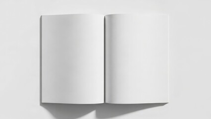 Naklejka premium An open blank book stands upright on a plain white surface casting a shadow.