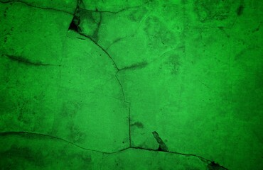 Vivid, textured green surface with pronounced cracks creates a bold abstract backdrop. Ideal for nature-inspired, eco-friendly, or modern design projects needing a striking green texture.