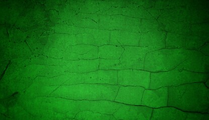 Vivid, textured green surface with pronounced cracks creates a bold abstract backdrop. Ideal for nature-inspired, eco-friendly, or modern design projects needing a striking green texture.