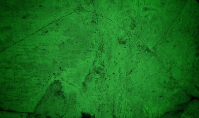 Vivid, textured green surface with pronounced cracks creates a bold abstract backdrop. Ideal for nature-inspired, eco-friendly, or modern design projects needing a striking green texture.