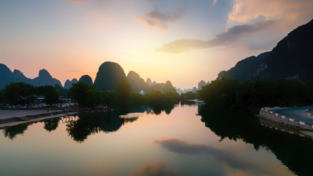 Sunset Over River with Karst Peaks and Reflections