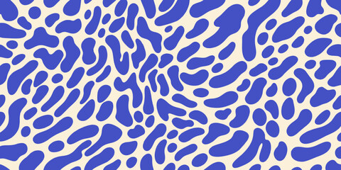 Obraz premium Abstract blue and cream pattern with organic irregular shaped spots