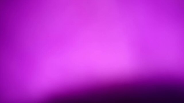 Una toma de cerca de un fondo abstracto de color violeta o morado con negro un degradado ligero desenfocado en movimiento