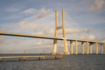 Obraz premium Vasco da Gama Bridge seen from riverside pier