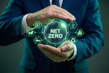 Businessman hands holding net zero digital hologram globe with green renewable energy icons