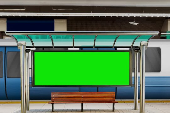 Blank green screen billboard at a modern metro or subway station platform with a train in the background. Ideal for advertising mockups, transportation concepts, and chroma key video or graphic design