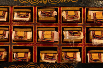 Tibetan scriptures in Khumjung monastery, Nepal. Tibetan Buddhist scriptures are a rich and diverse collection of sacred texts that form the foundation of Tibetan Buddhism.