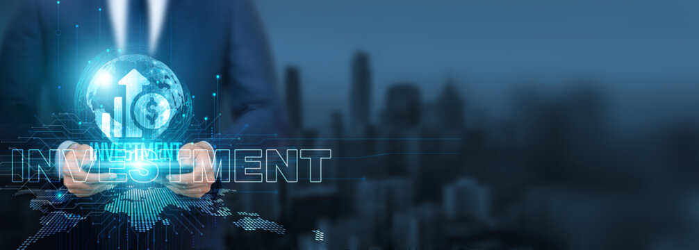 Investment technology, Businessman using investment technology with tablet on global network, finance and innovation, Global investment and economic growth, and digital investment. - Powered by Adobe