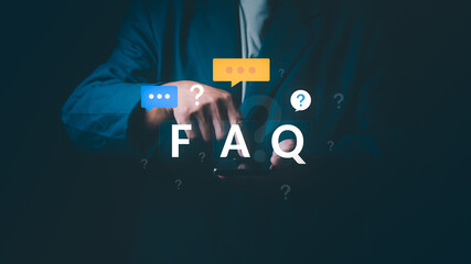 Close up of businessman using smartphone with FAQ icon and question marks, Concept of customer support, frequently asked questions, online help desk, information service, and user assistance.