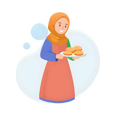 Muslim girl in hijab serving traditional cookies for Ramadan and Eid celebration