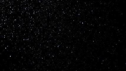 White dust particles slowly falling down on black background - Powered by Adobe