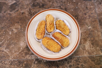 typical Indonesian snacks served at weddings or engagements