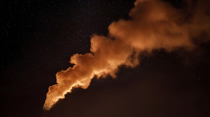 A large plume of orange industrial smoke billows into the dark star filled night sky