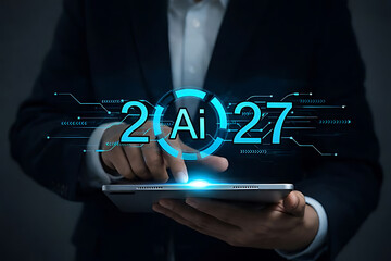 Person holding digital tablet with artificial intelligence logo in year 2027 text illustrating future technology trends and automation