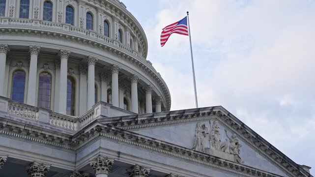 Historic Capitol by the national flag. Capitol dome as symbol of law. Washington monument architecture. Washington DC. US Senate. Federal government in the nation capital. USA symbol