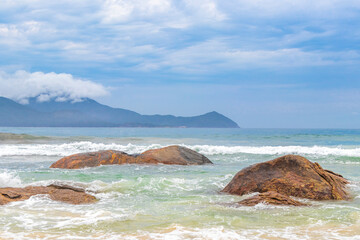Aventureiro Beach tropical panorama rocks boulders Ilha Grande island Brazil.