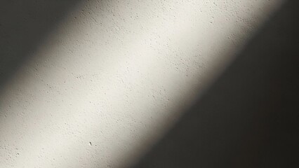 Dramatic Beam of Light Illuminating White Surface with Diagonal Shadow