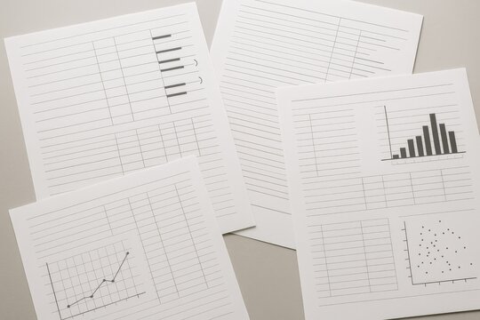 Financial documents and data charts business analysis reports showing growth trends and data points. - Powered by Adobe