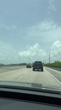 Key Largo, Florida, USA, June 28, 2025: Driving on US 1 Overseas Hwy to the Florida Keys. Traffic on Overseas Highway US 1.