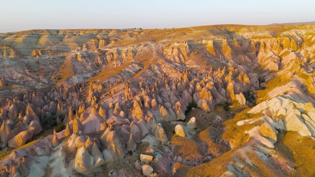 Goreme, Nevsehir, Turkey. Detailed aerial shot of Devrent Valley revealing intricate erosion details and rock textures during evening light.. Aerial View