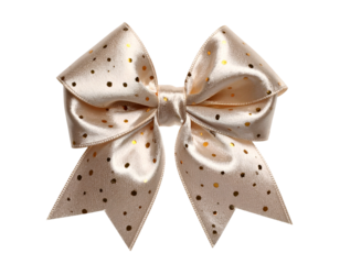 Creamy satin bow with gold polka dots. Central knot and flowing loops; isolated on black