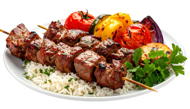 Grilled meat skewers with colorful roasted vegetables and white rice on a white plate
