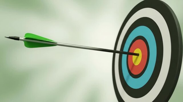 Arrow hitting center of target's bullseye with motion blur. Concept of success, accuracy, and achieving goals
