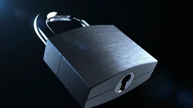 A silver padlock with a brushed metal finish and a shackle, against a dark background