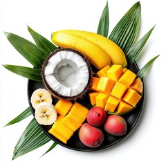 A beautifully arranged plate of fresh tropical fruits including mangoes, bananas, coconut, and palm leaves creates a vibrant and delicious visual treat.