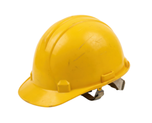 A worn yellow safety helmet, commonly used in construction and industrial settings, showcasing signs of use.