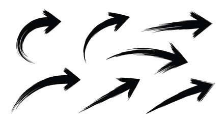 Fototapeta premium Collection of seven expressive black ink brush arrows with irregular edges provides a creative hand drawn look for directional graphic elements.