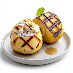 Grilled melon halves filled with coconut rice and banana slices, drizzled with caramel sauce, showcased on a plate against a bright, clean white background.