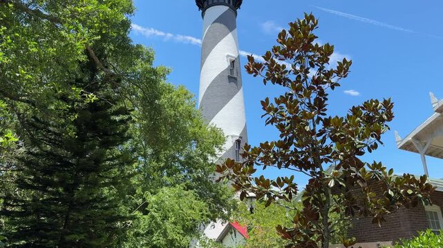TILT SLOW MOTION SHOT - The St. Augustine Light Station is a privately maintained aid to navigation and an active, working lighthouse in St. Augustine, Florida, USA.