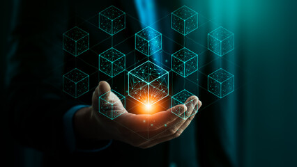 Blockchain network and digital data security technology concept with businessman holding virtual blocks, representing innovation, decentralization, transparency, secure digital transaction system
