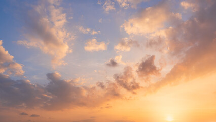 Sunset Sky Cloud Background,Evening Dramatic Dusk sky sun dawn Clouds with Orange,Yellow, Blue warm sunlight in Summer season, Horizon morning Sunrise sky colorful gold beautiful nature sweet Sunshine