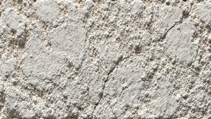 Cracked, bumpy white plaster texture